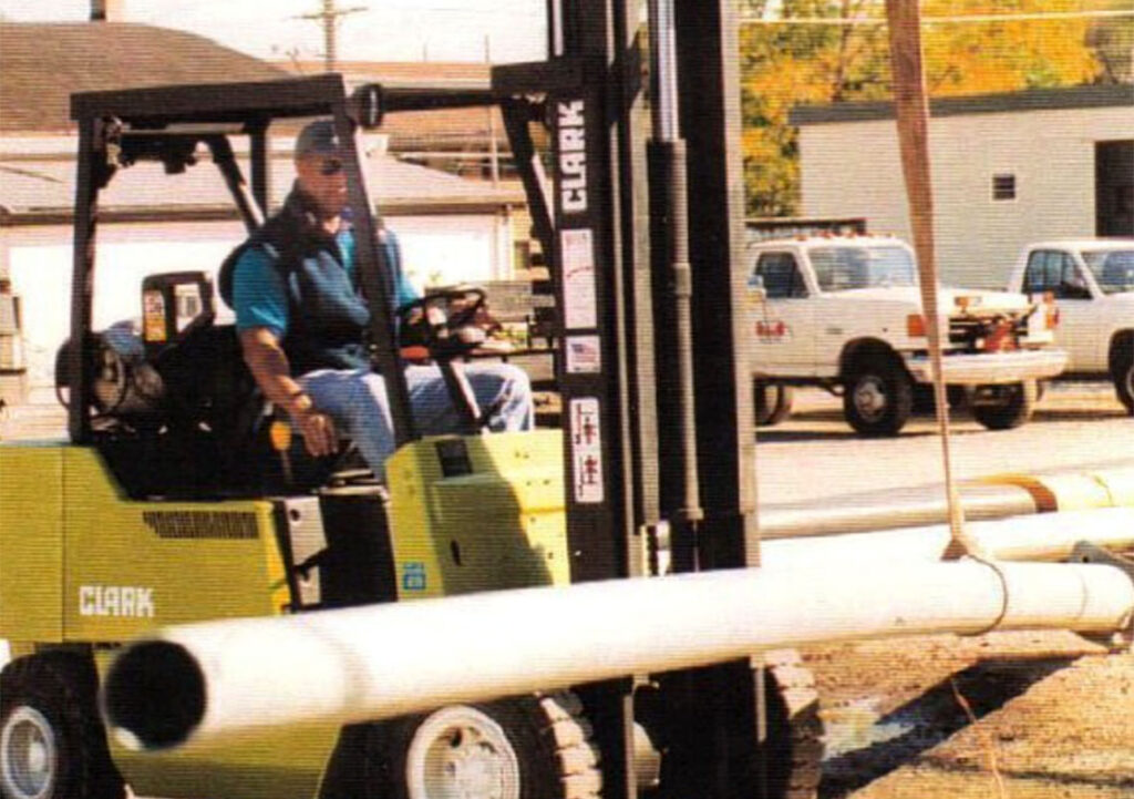 Man operating fork lift