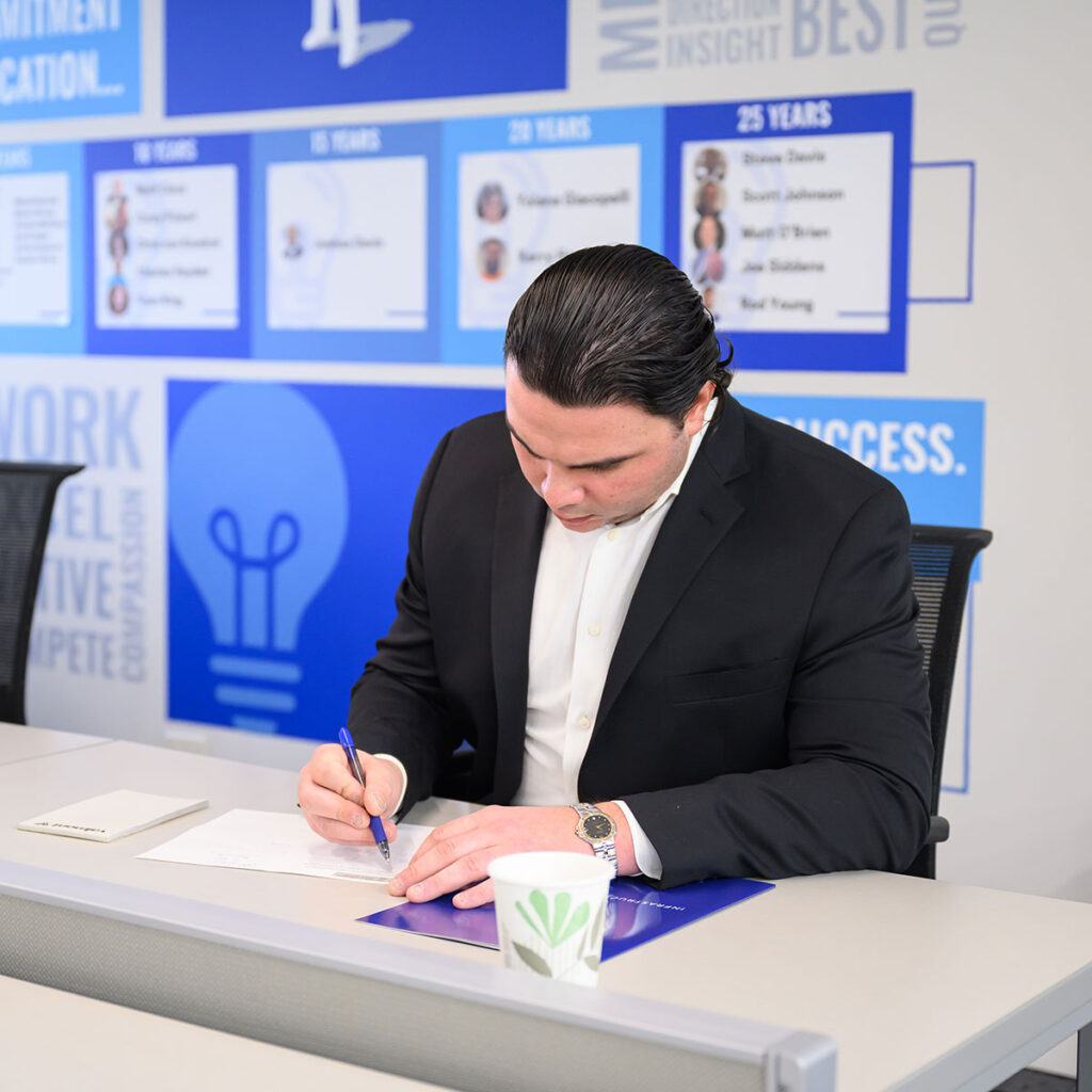 The Will Group employee working at a desk